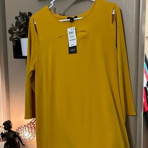 Mustard colored mid sleeve with cut outs